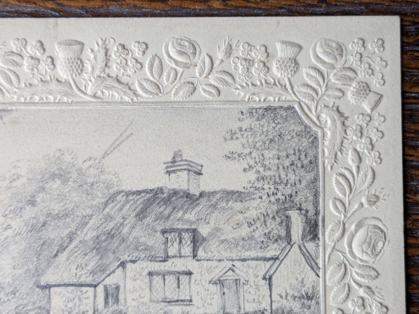 Antique miniature drawing in embossed border