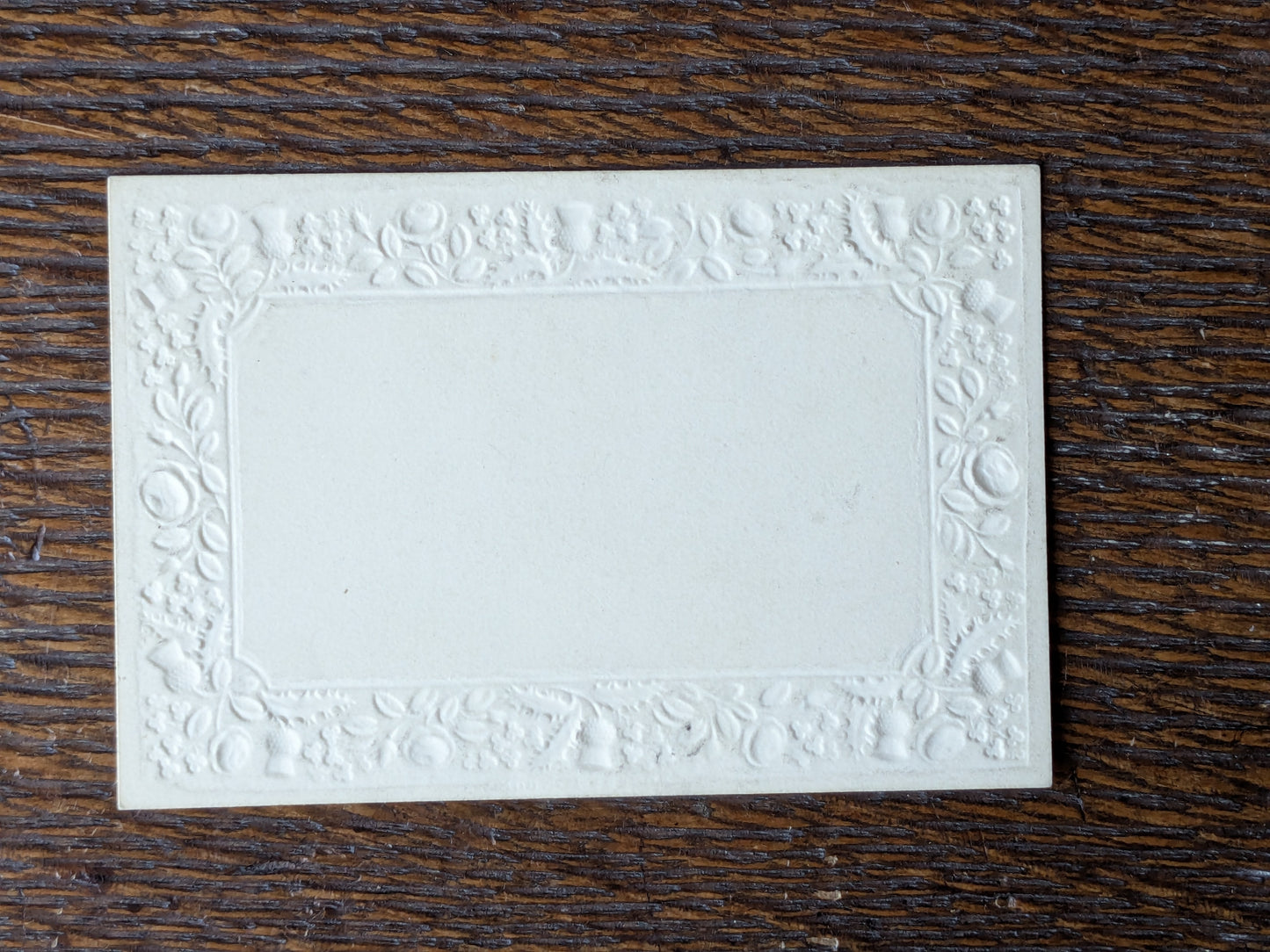 Antique miniature drawing in embossed border