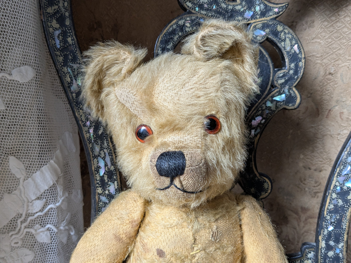 Vintage teddy bear in hand knitted Aran jumper