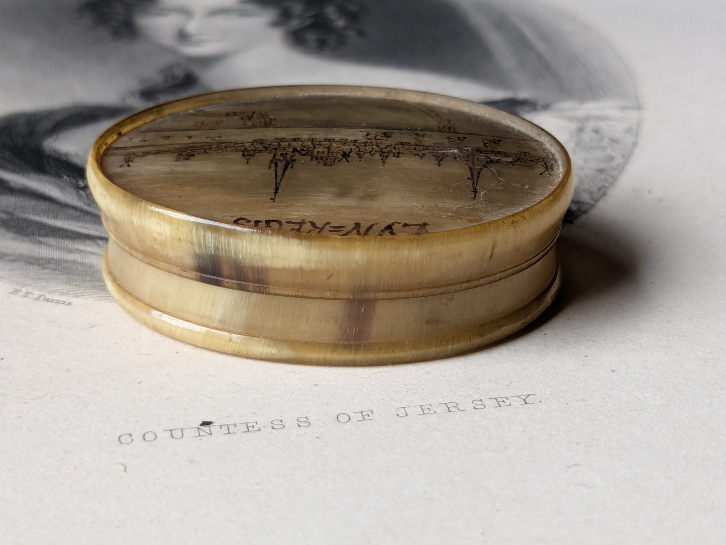 Antique horn snuff box with miniature writing inside