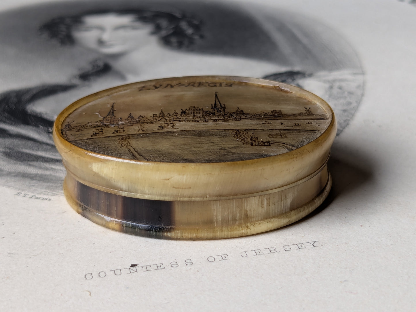 Antique horn snuff box with miniature writing inside