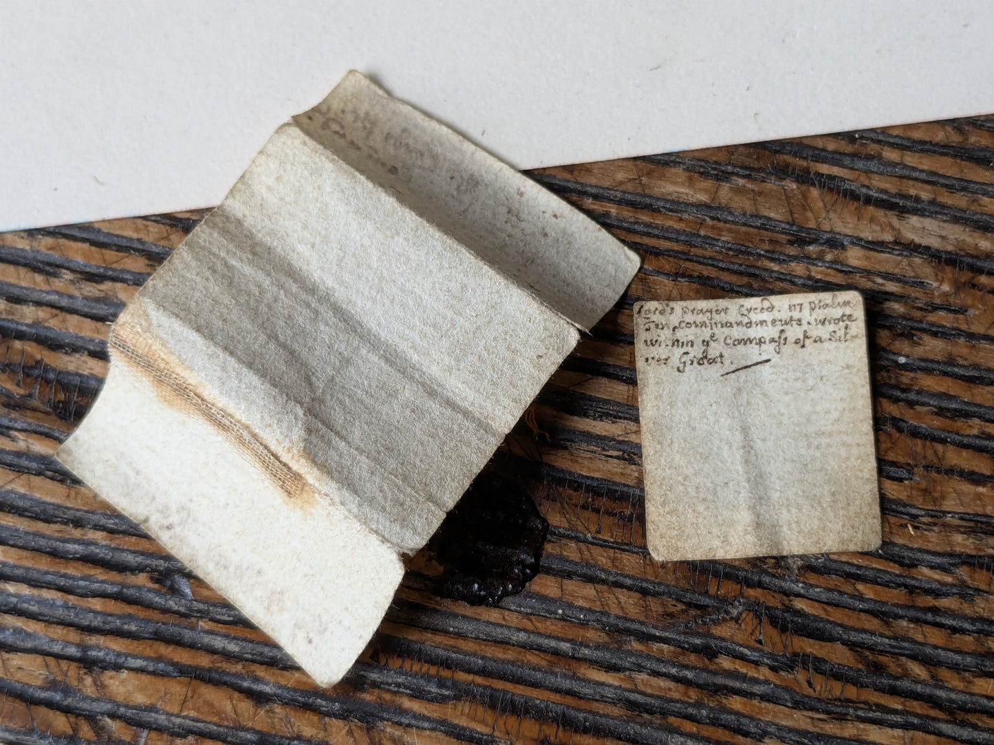 Antique horn snuff box with miniature writing inside