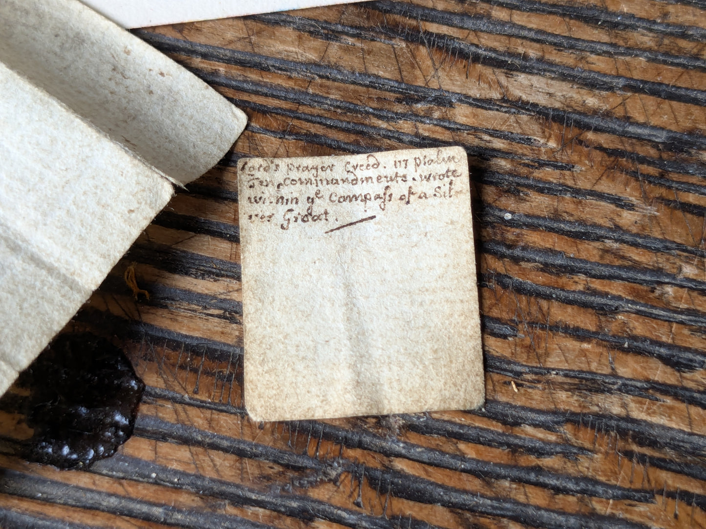 Antique horn snuff box with miniature writing inside