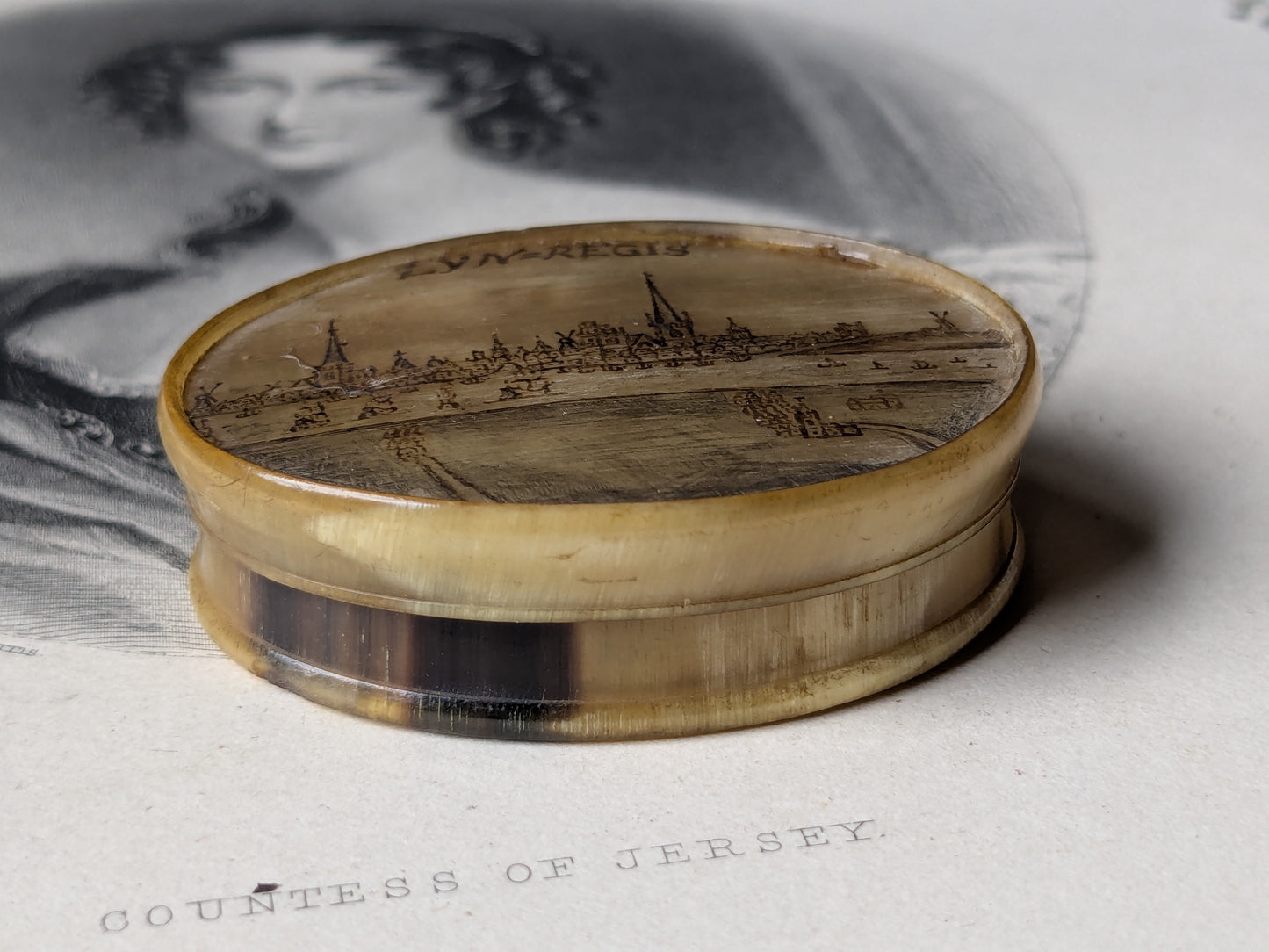 Antique horn snuff box with miniature writing inside
