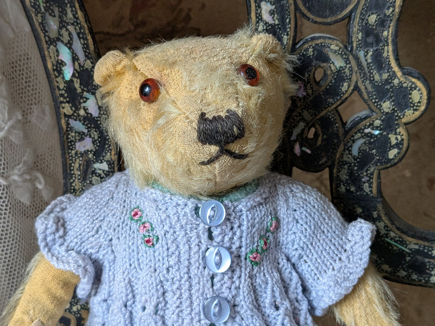 Small vintage Merrythought bear in charming clothes