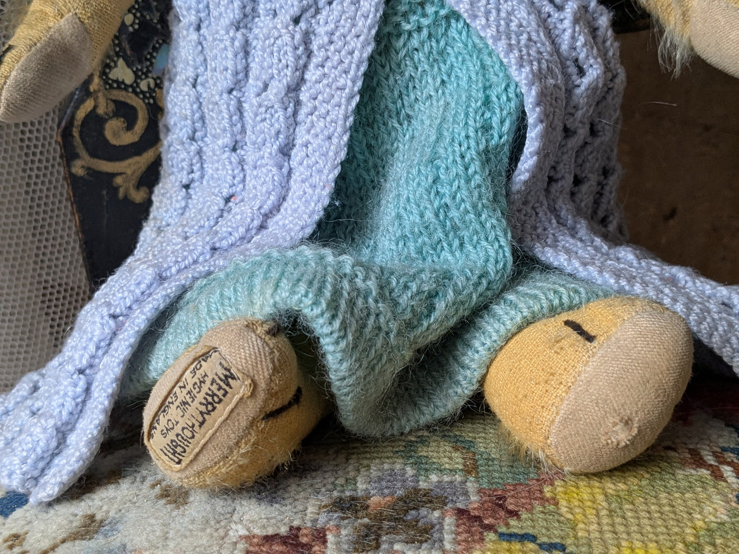 Small vintage Merrythought bear in charming clothes