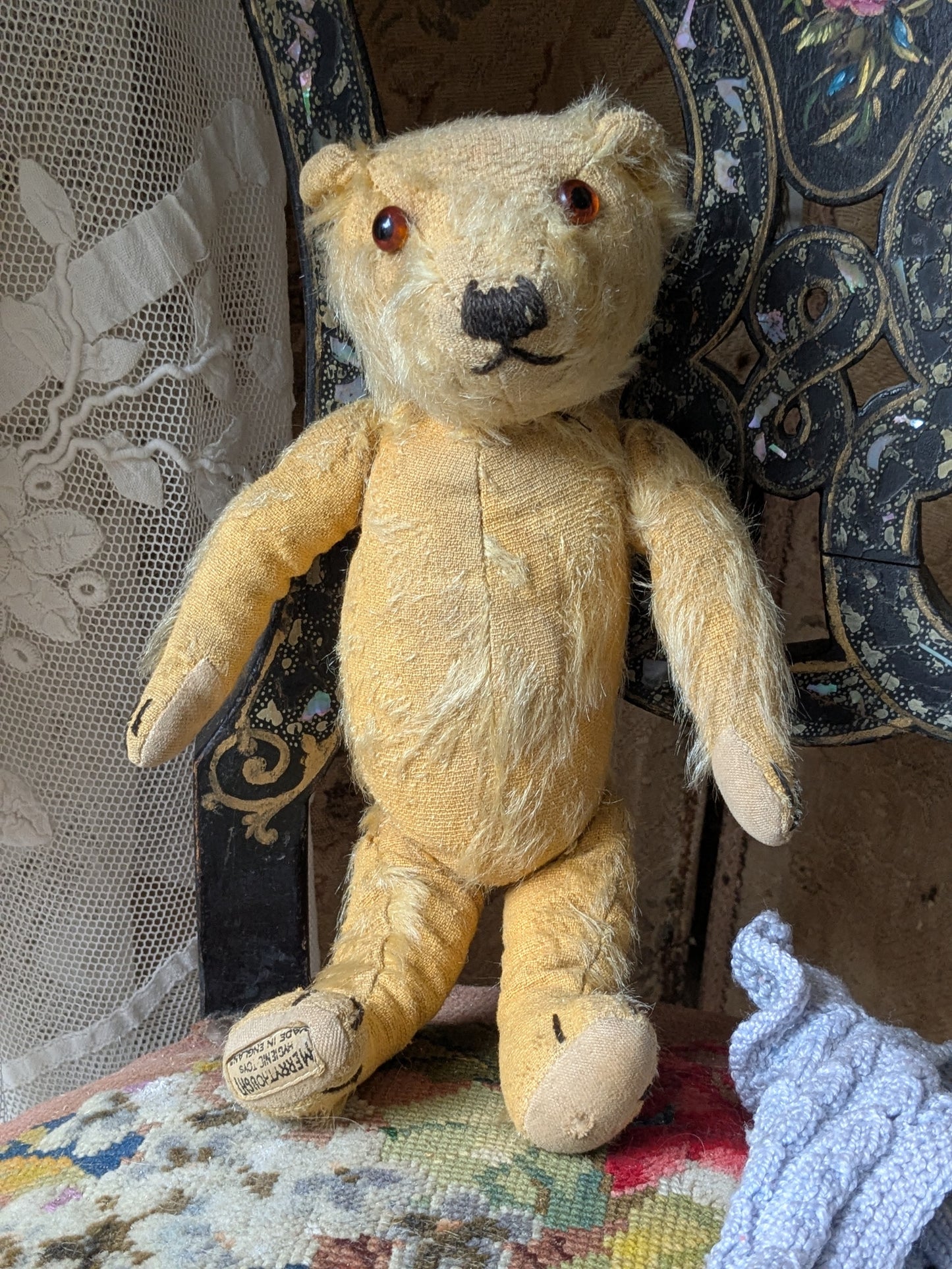 Small vintage Merrythought bear in charming clothes