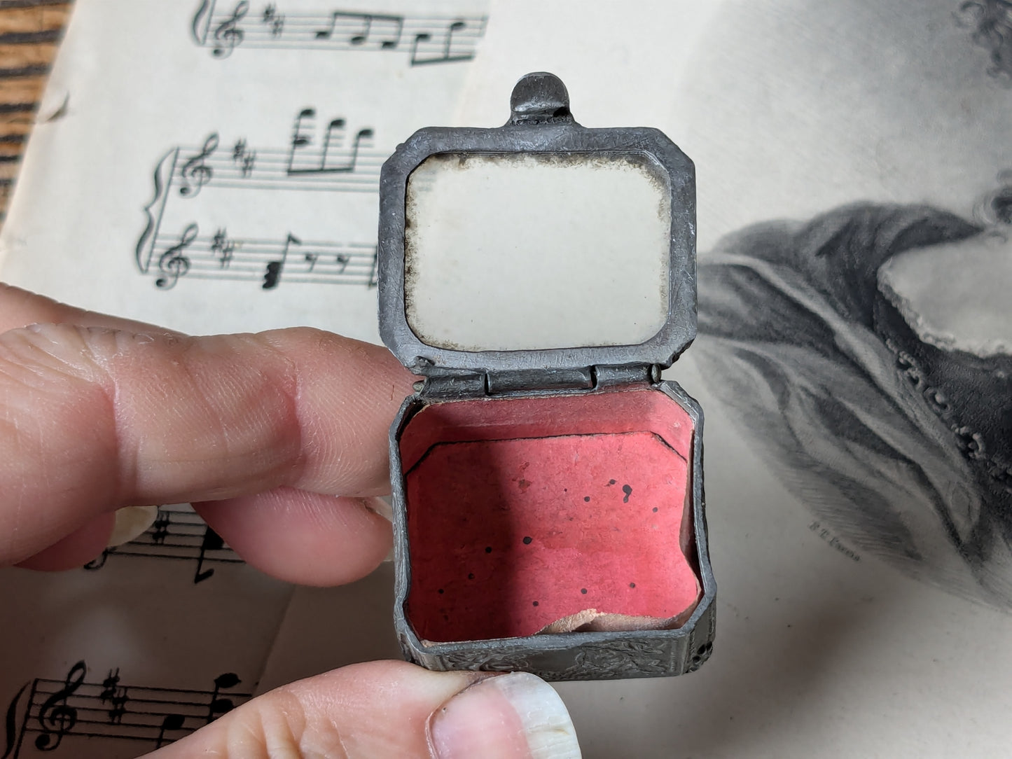 Miniature glass casket for a dolls house
