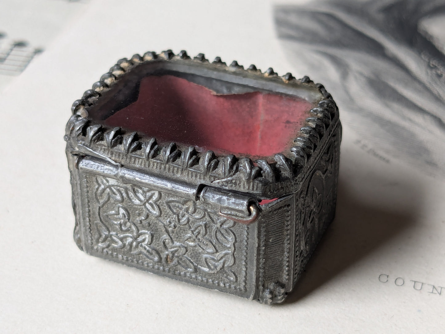 Miniature glass casket for a dolls house