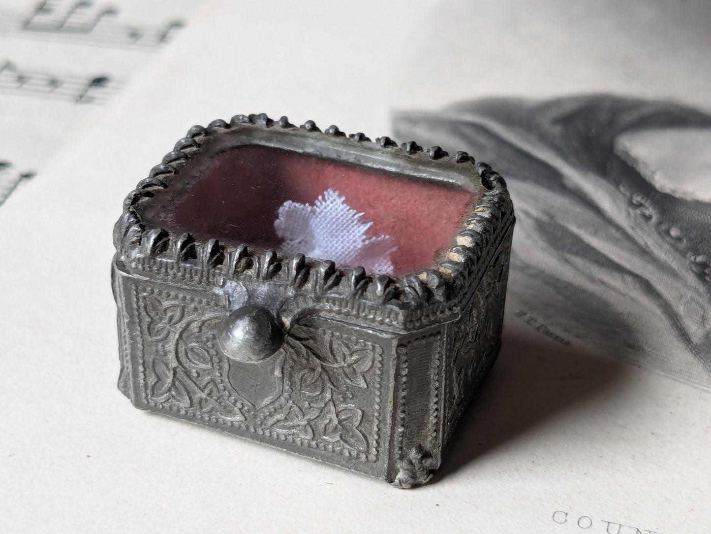 Miniature glass casket for a dolls house