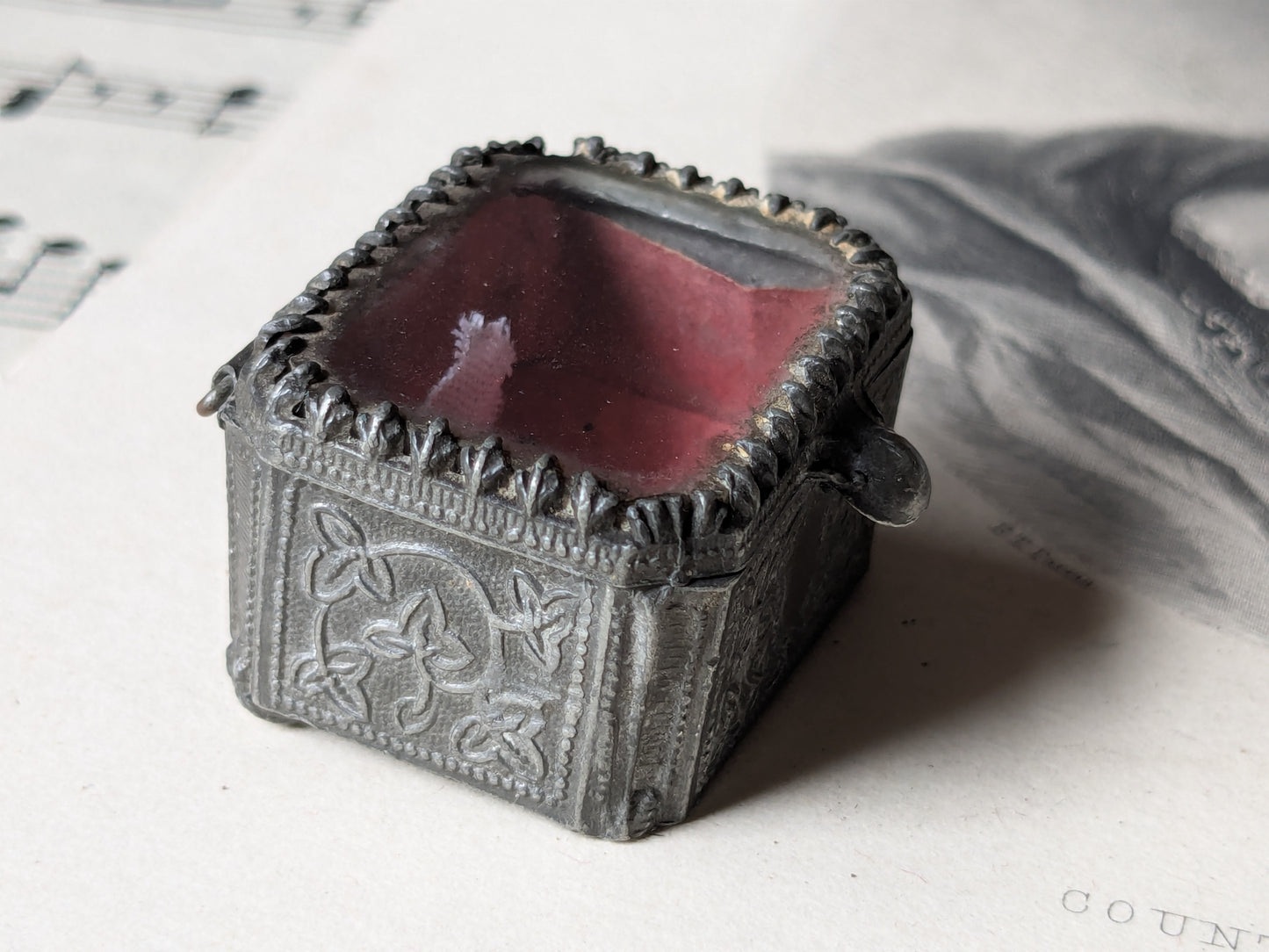 Miniature glass casket for a dolls house