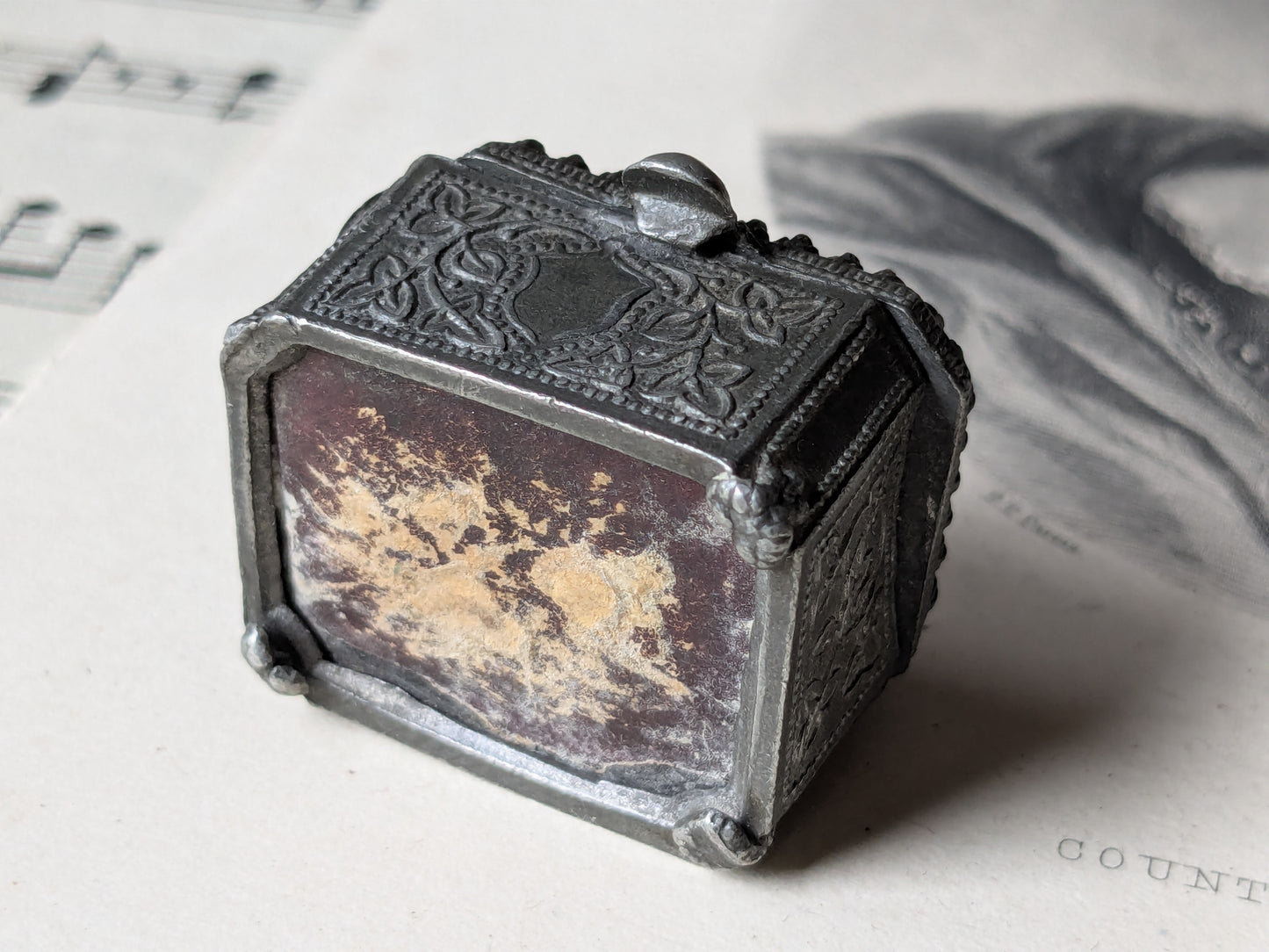 Miniature glass casket for a dolls house