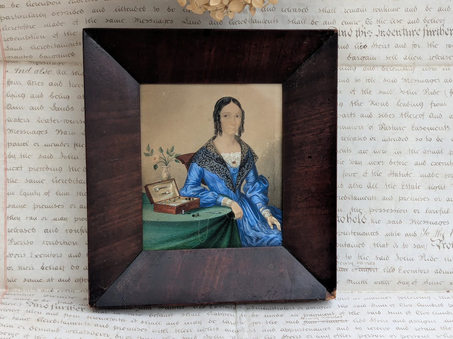 Antique portrait miniature of a lady with her workbox