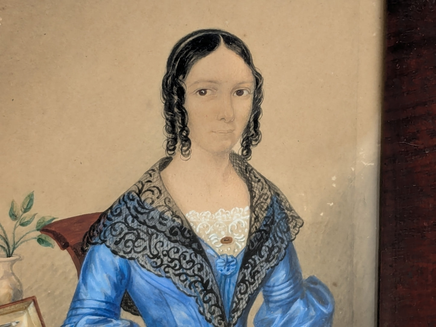 Antique portrait miniature of a lady with her workbox