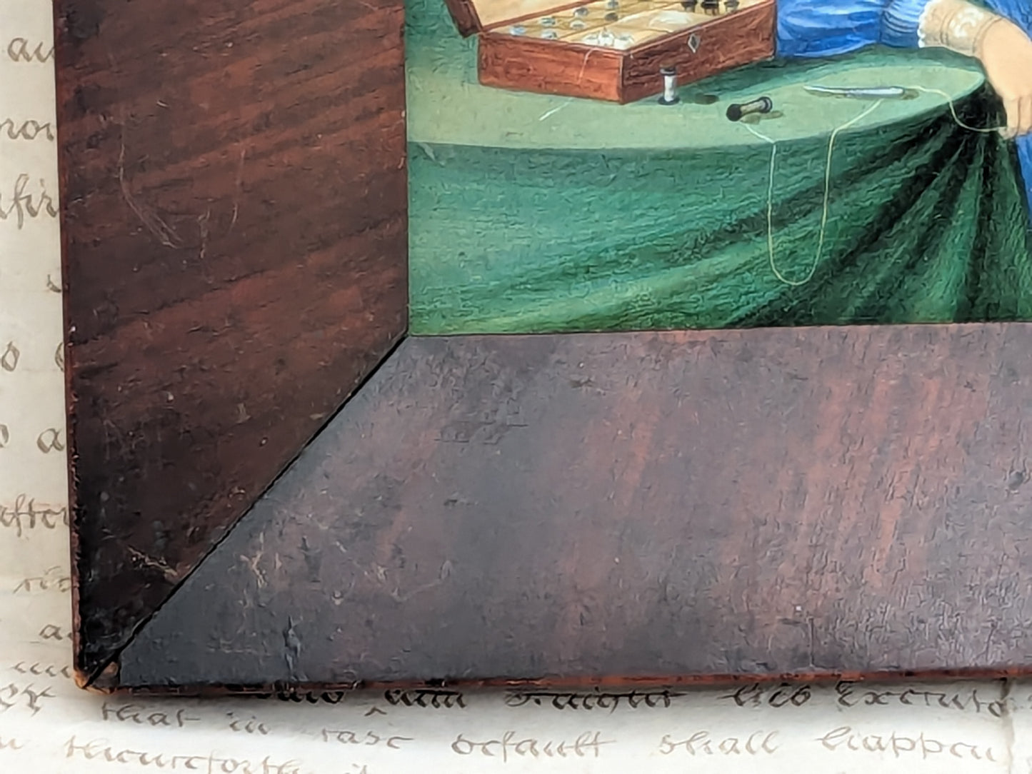 Antique portrait miniature of a lady with her workbox