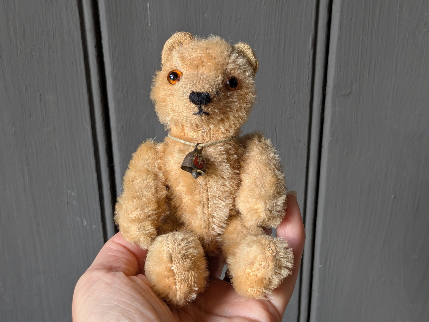 Tiny vintage teddy bear