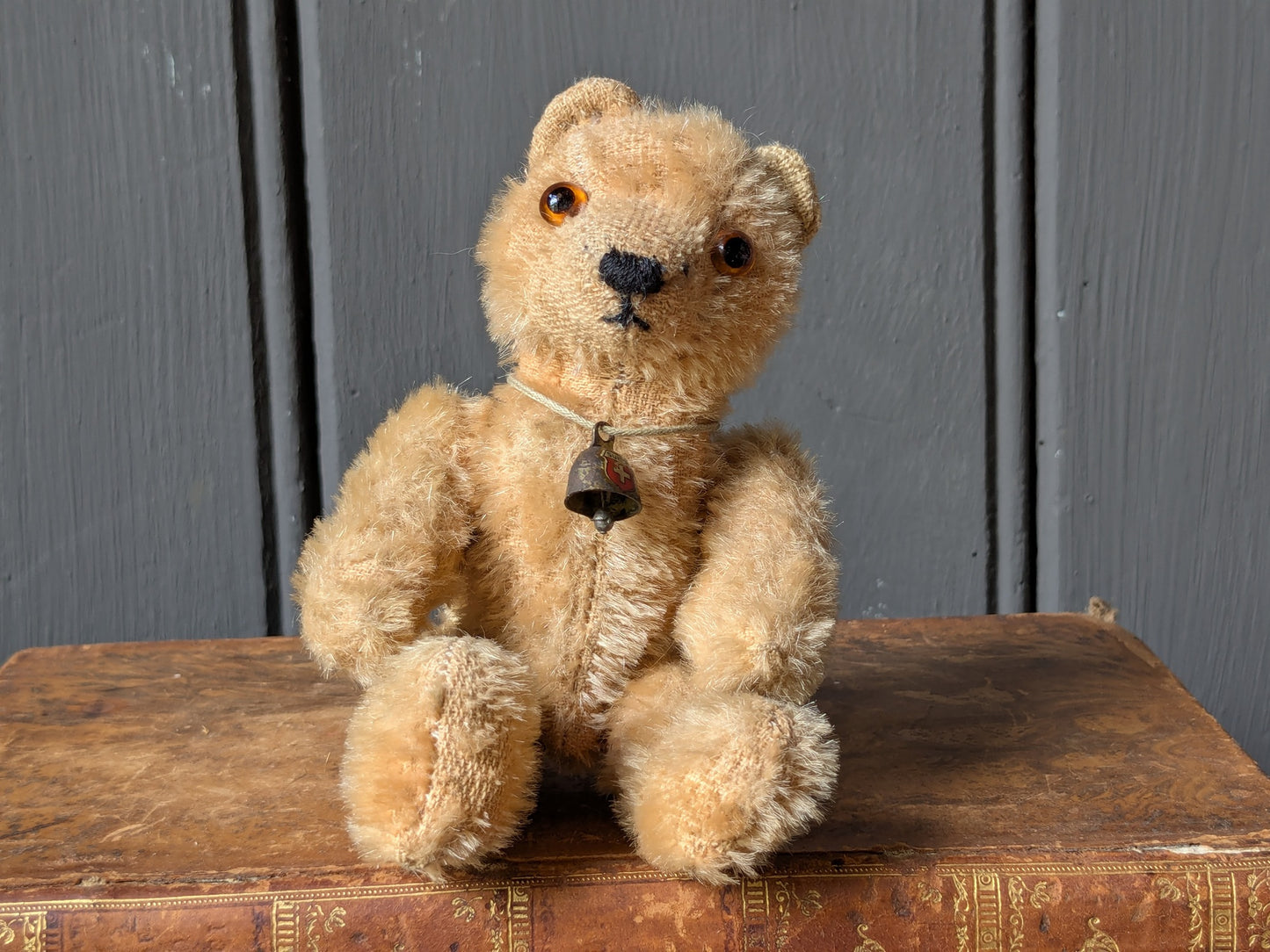 Tiny vintage teddy bear
