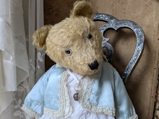 Vintage 25 inch Chiltern teddy bear in antique clothing
