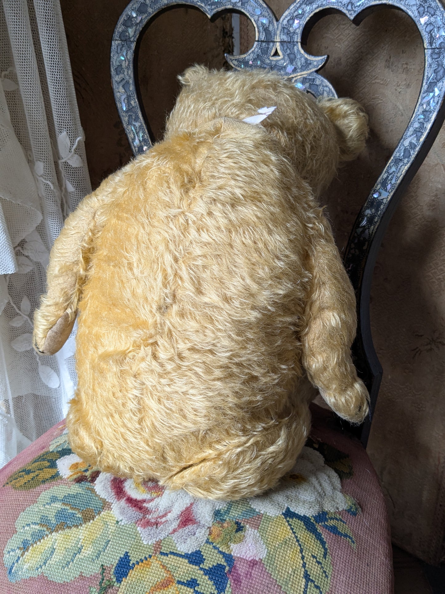 Vintage 25 inch Chiltern teddy bear in antique clothing