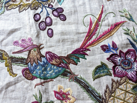 Antique embroidered fabric with birds