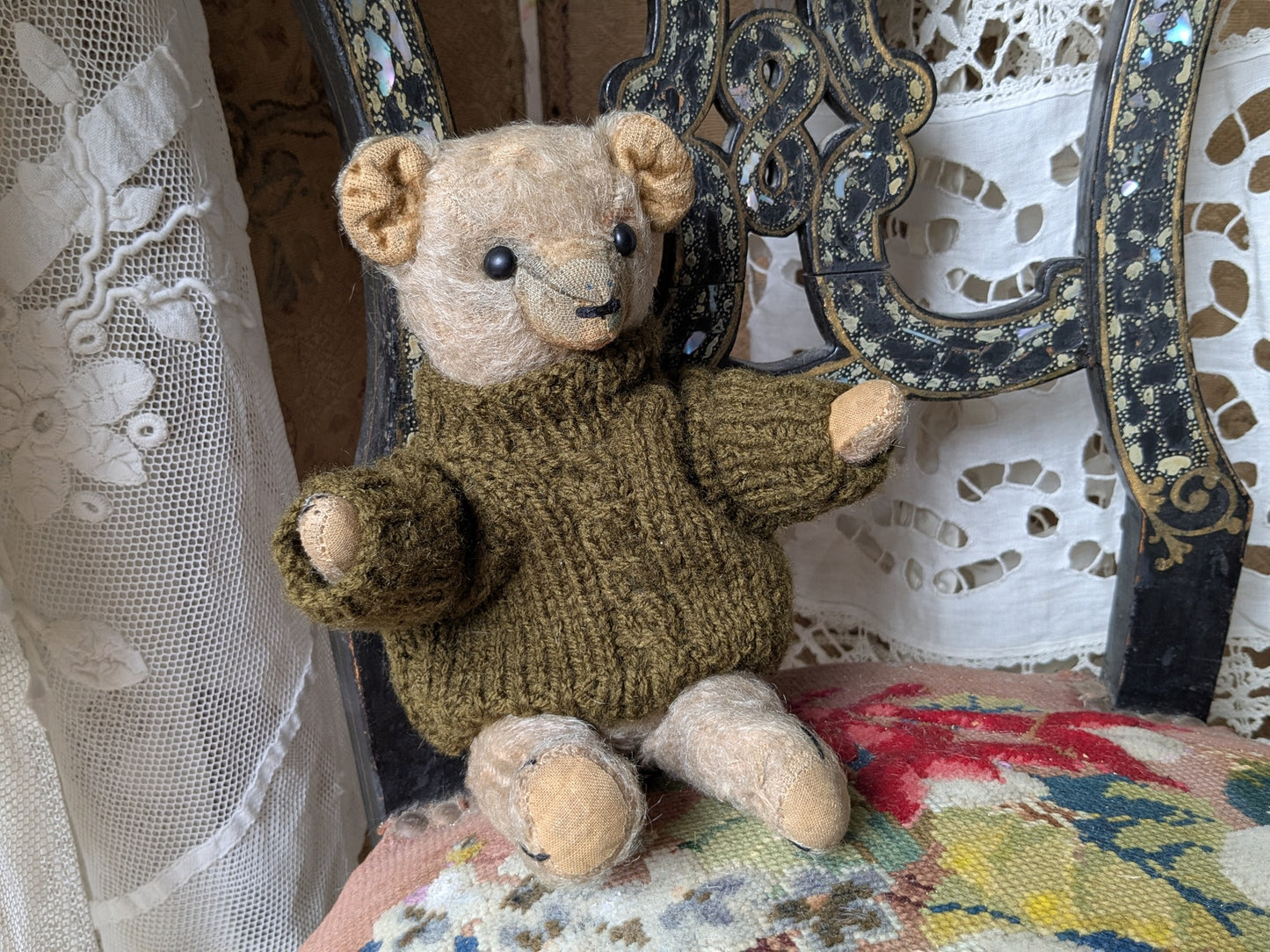 Small antique bear with boot button eyes