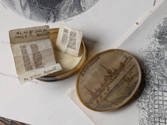 Antique horn snuff box with miniature writing inside