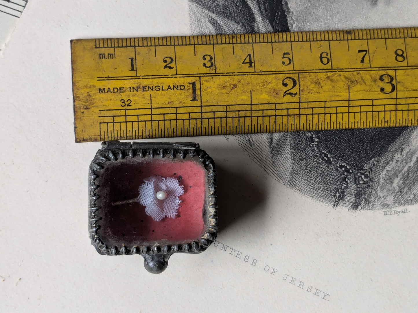 Miniature glass casket for a dolls house