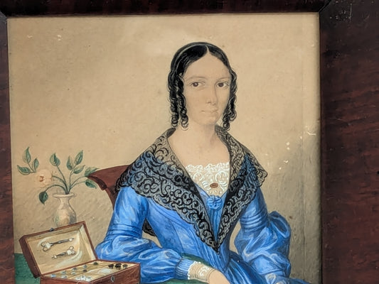 Antique portrait miniature of a lady with her workbox