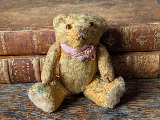 Tiny vintage teddy bear